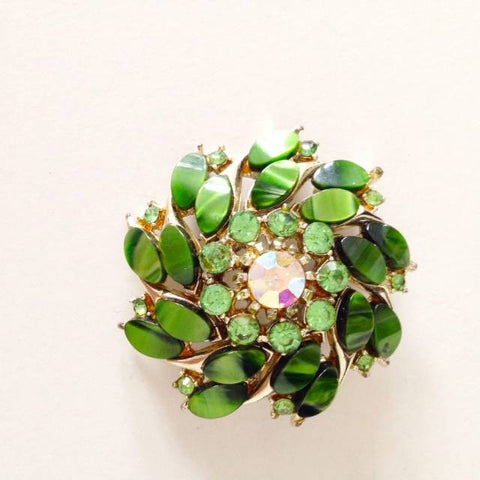 Green Thermoset brooch sold