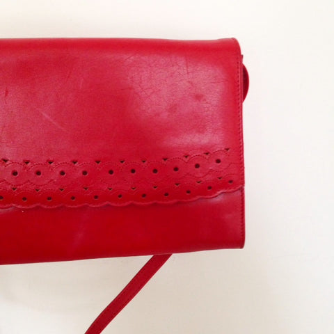 Red leather clutch
