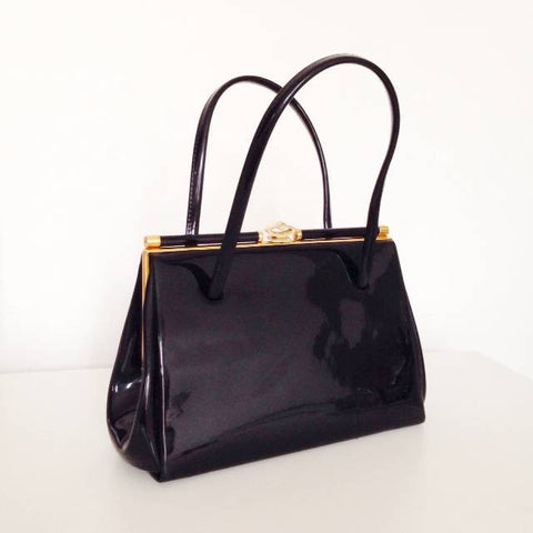 Mini black patent handbag sold out