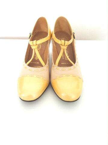 Yellow and cream t-bar shoes