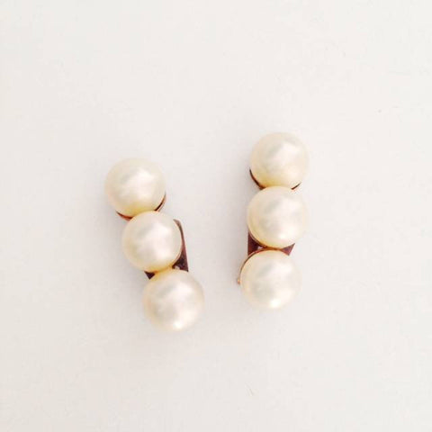 Triple pearl earrings Sold
